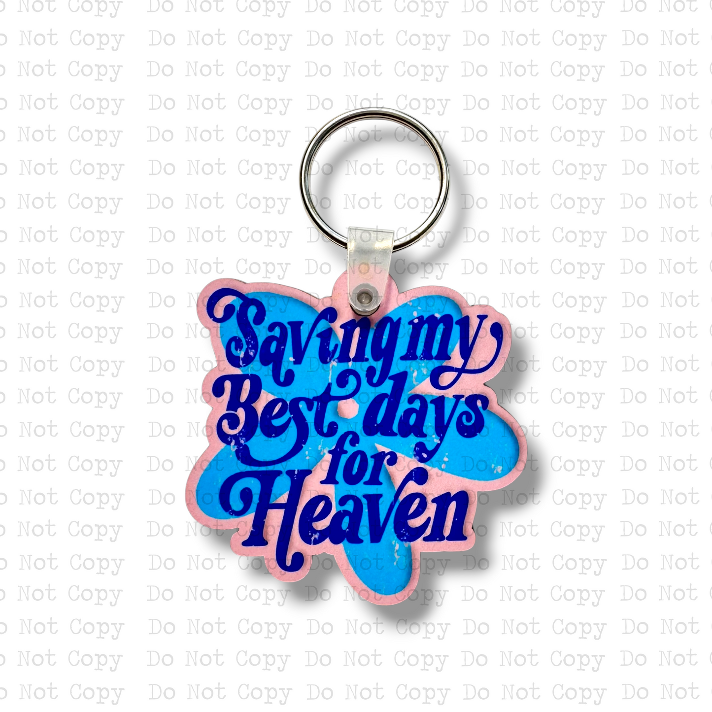 Custom-shaped contoured butterfly MDF wood sublimation keychain blank kit featuring a pink and blue watercolor with the text Saving my Best days for Heaven, shown with keyring hardware.