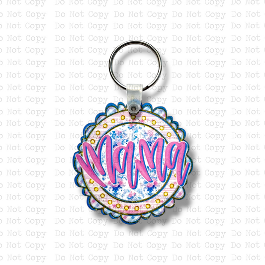 Custom-shaped contoured scalloped round MDF wood sublimation keychain blank kit featuring a Western style floral circle design with the text Mama in hot pink script, shown with keyring hardware.